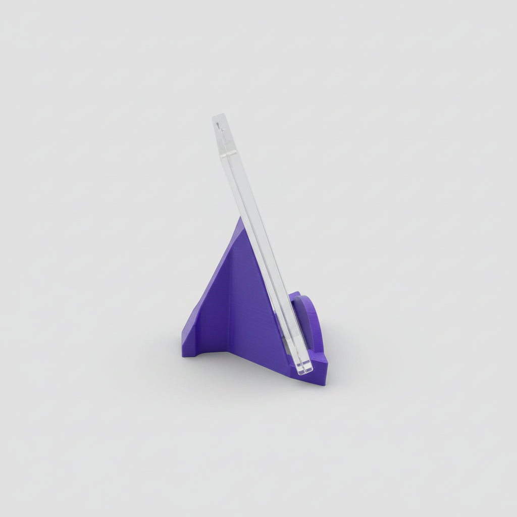 Purple triangular pen holder with a white pen on a light gray background