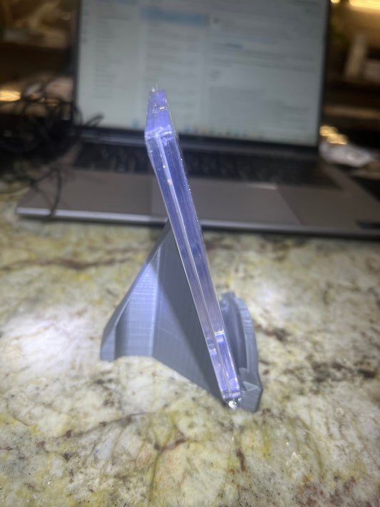 Clear plastic tool on a marble surface with a blurred background