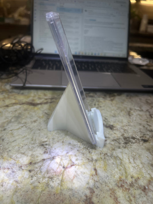Clear plastic stand on a laptop on a marble surface