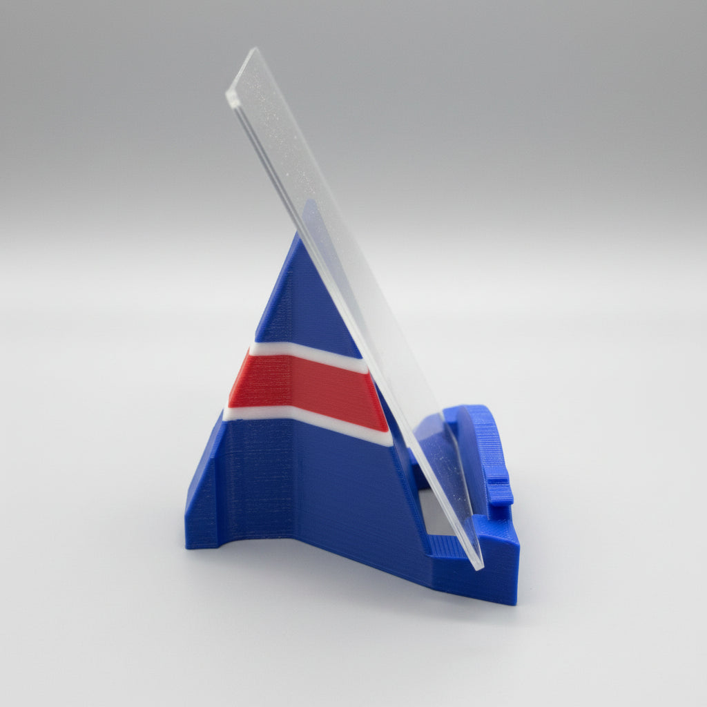 Blue plastic stand with a red and white striped object on a metallic surface