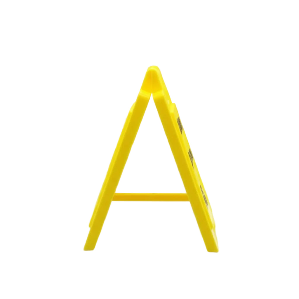 Yellow safety triangle on a reflective surface