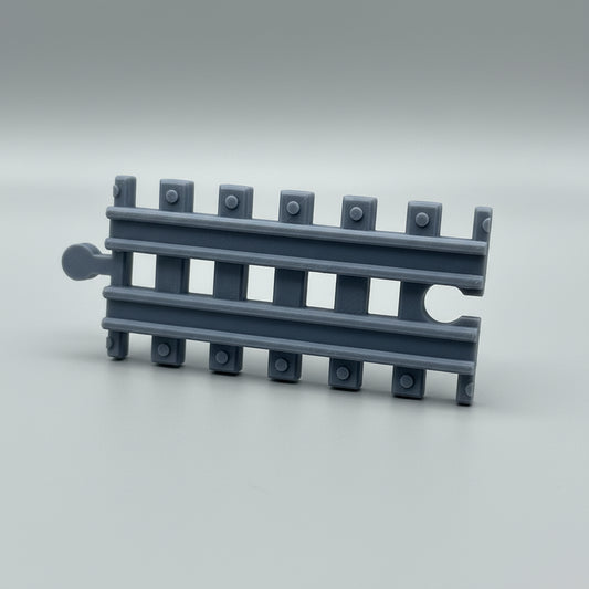Gray metal bracket on a textured metallic surface