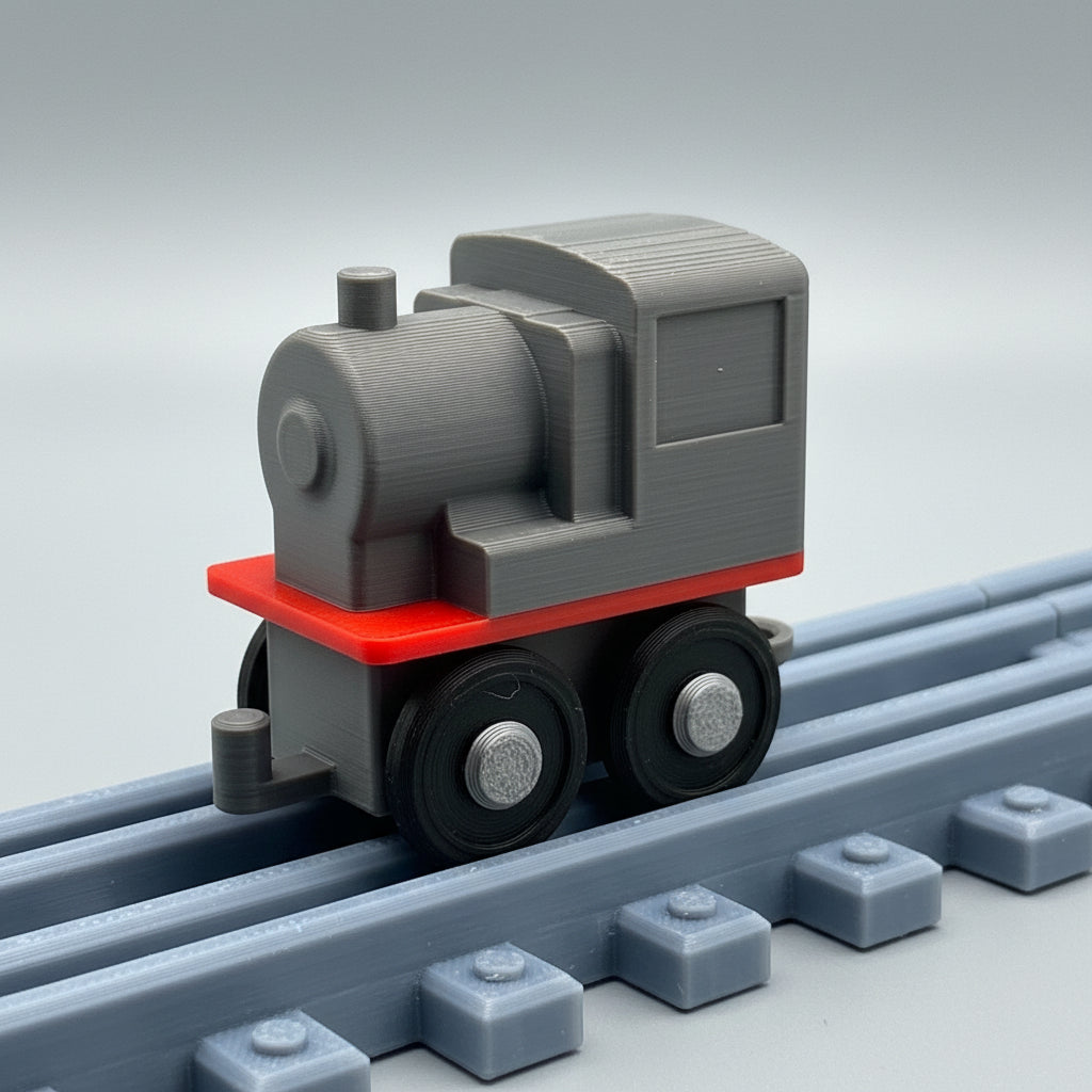 Toy train engine on tracks with a textured background