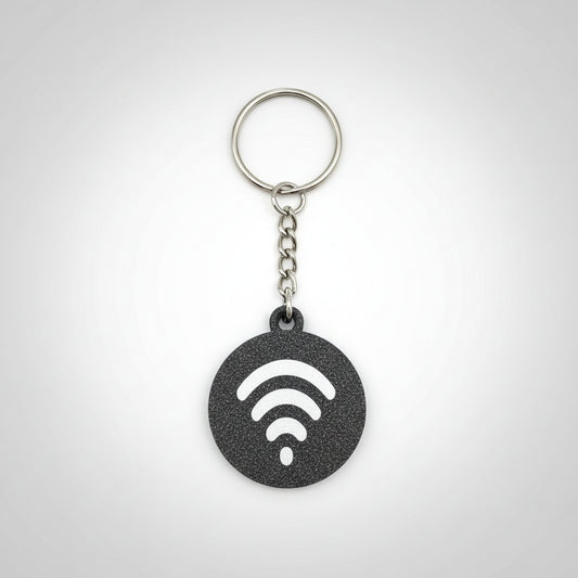 Keychain with Wi-Fi symbol on a wooden surface