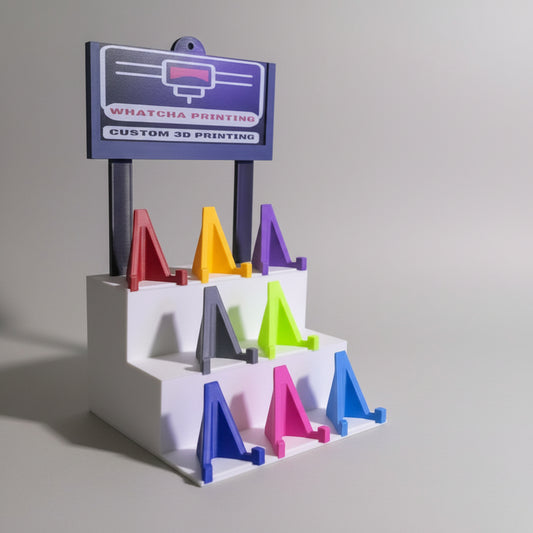 Colorful 3D printed objects on a display stand with sports card background