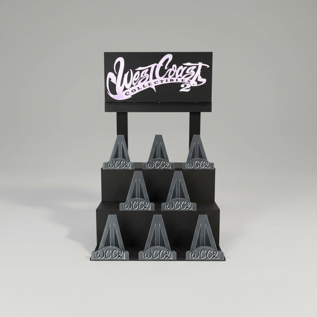 Display stand with multiple 'WCC2' branded items against a dark background