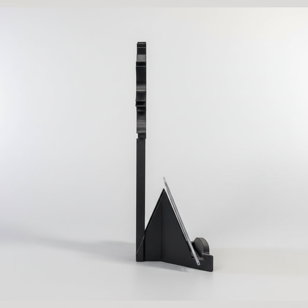 Collection of sports trading cards on a table with a card holder.