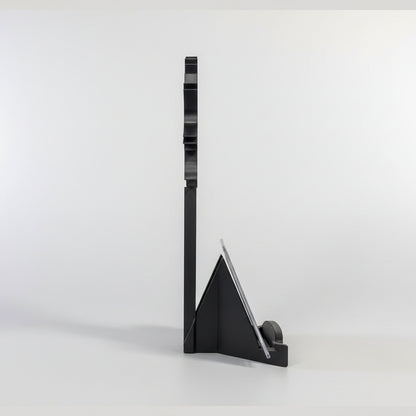 Collection of sports trading cards on a table with a card holder.