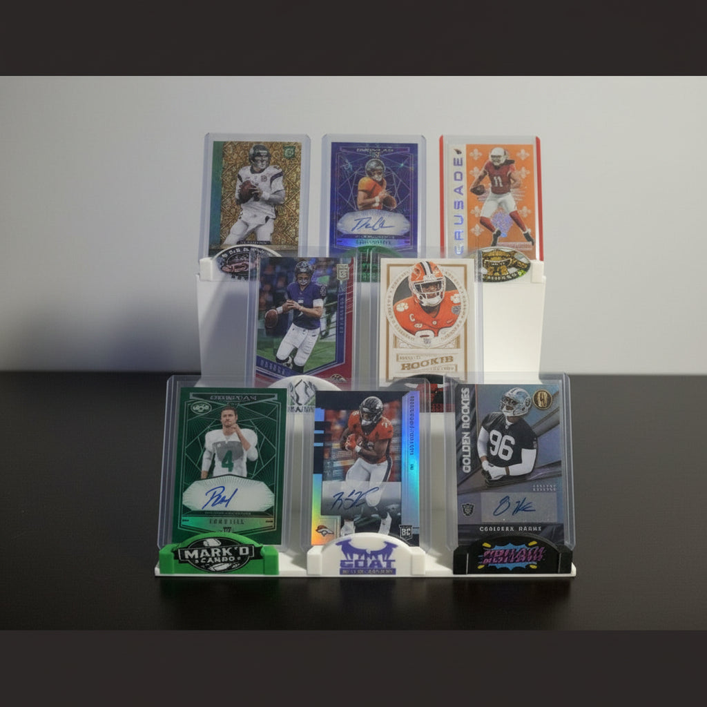Collection of sports trading cards on a display stand with a background of more cards.