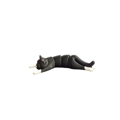 Cat-shaped toy on a wooden surface