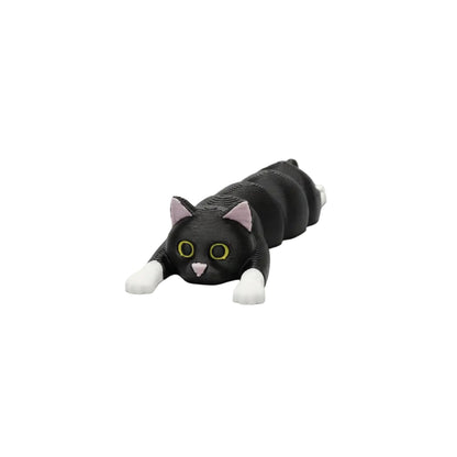 Cat-shaped toy on a wooden surface