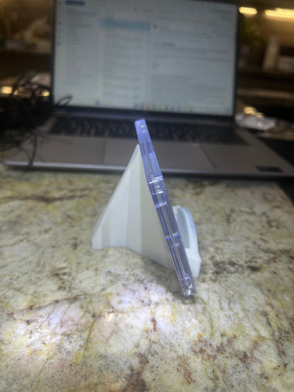 Clear plastic container with a white lid on a marble surface