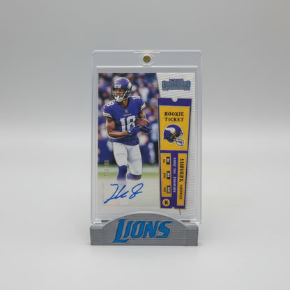 Football trading card featuring a player in a blue uniform with 'Lions' branding, surrounded by other similar cards.