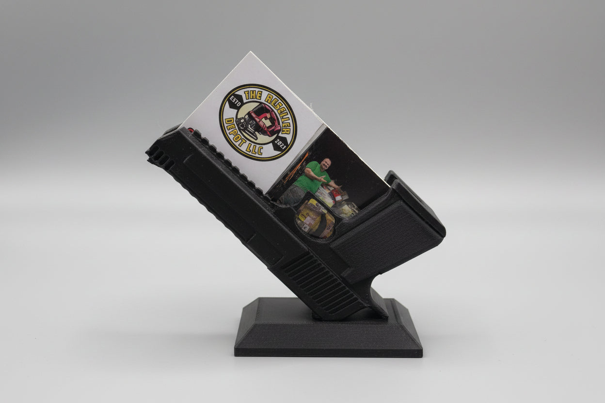 Black card holder with a card featuring a character and logo on a gray background