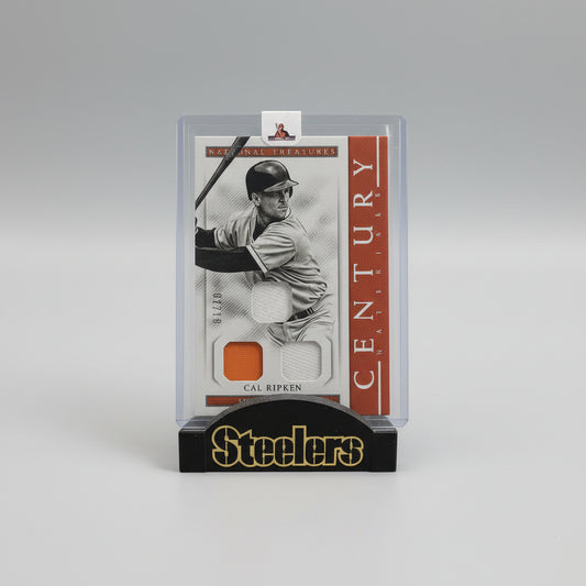 Baseball trading card packaging featuring a player in a black and orange uniform with 'Steelers' branding.