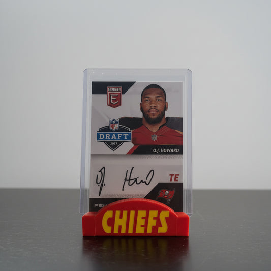 Trading card of a football player with 'Chiefs' branding on a stand against a blurred background
