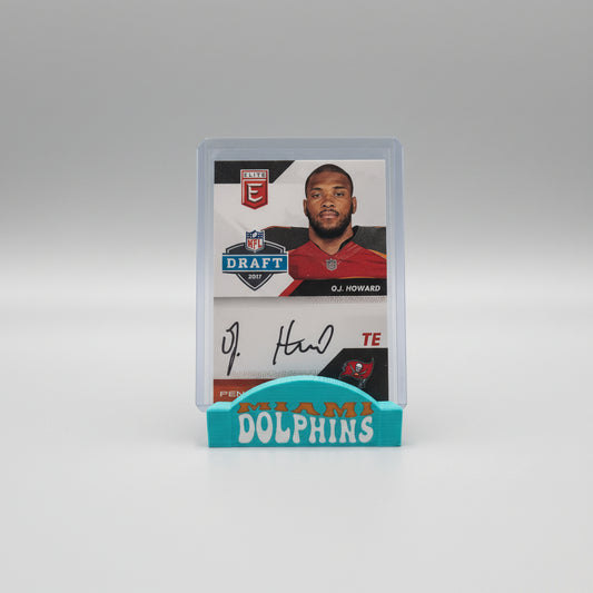 Trading card of O.J. Howard with Miami Dolphins logo in the background
