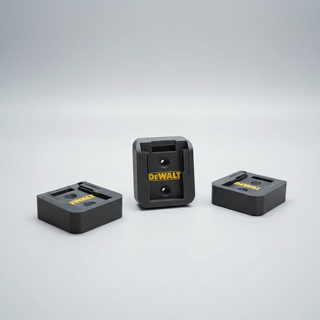 DeWalt battery chargers on a wooden surface with DeWalt power tools in the background.
