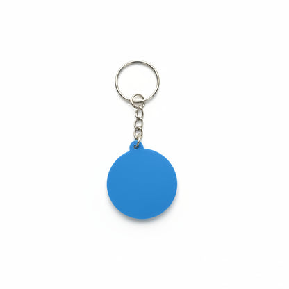 Blue keychain tag on a textured black background