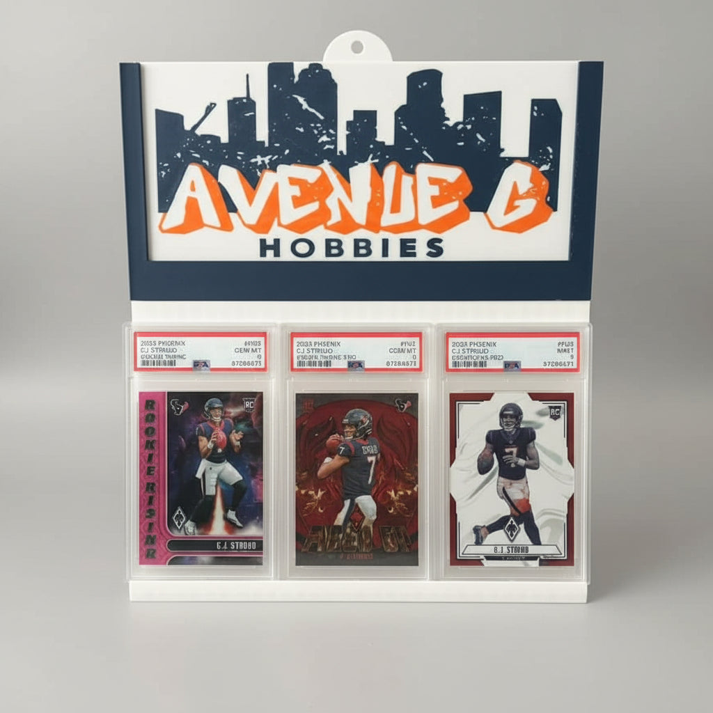 Display case with sports trading cards featuring player images and 'Avenue 6 Hobbies' branding.
