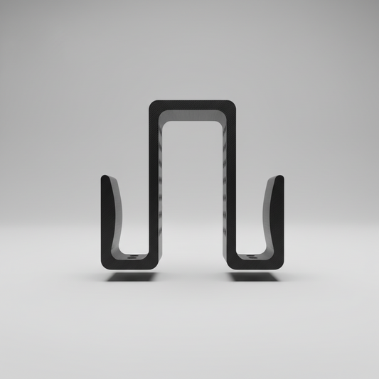 Black rectangular object held in a hand with a blurred background