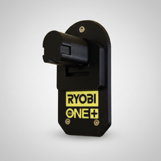 Black Ryobi One+ tool attachment on a beige background