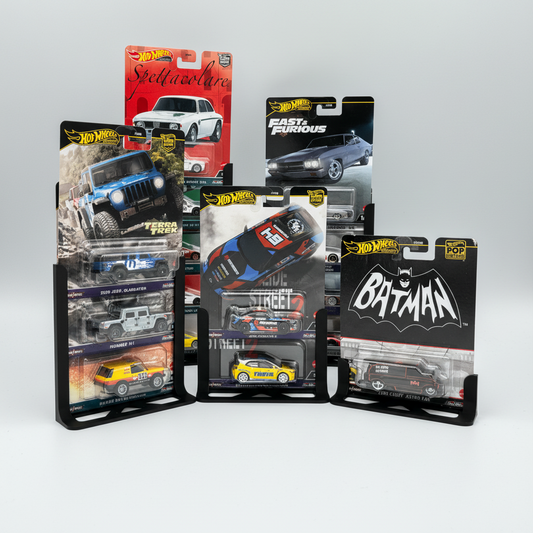 Collection of Hot Wheels model car packaging on a white background