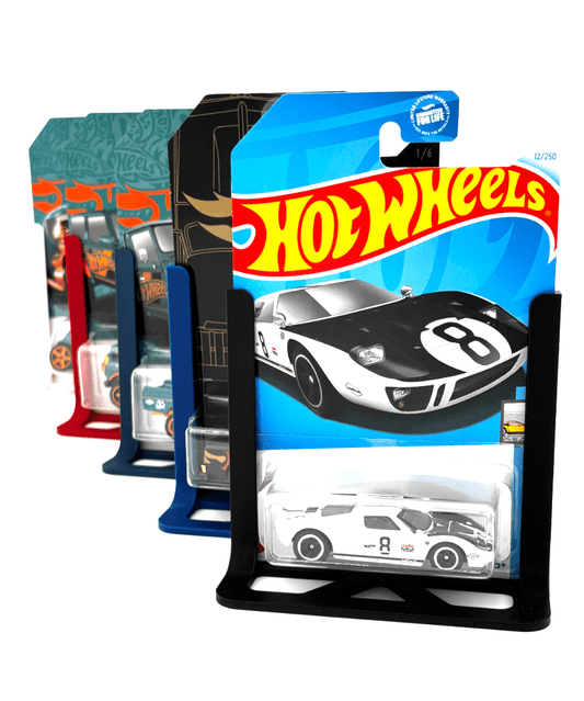 Hot Wheels toy car packaging with a white car on a blue background