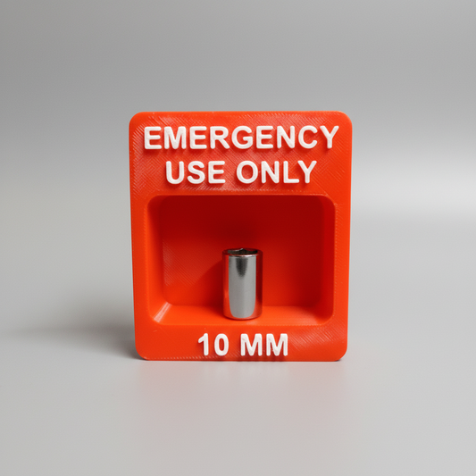 Red emergency device with 'EMERGENCY USE ONLY' text on a colorful abstract background