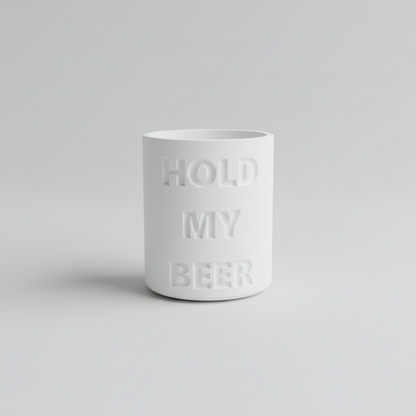 Person holding a can with 'Hold My Beer' text, wearing jeans and a dark shirt.