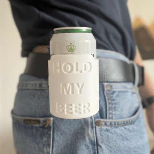Person holding a can with 'Hold My Beer' design against a neutral background