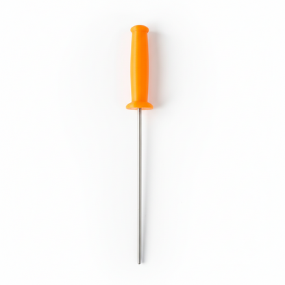 Metal rod with orange handle on a wooden surface