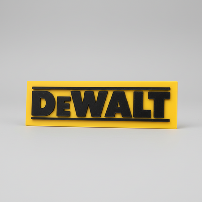 Hand holding a yellow and black Dewalt sign against a blurred background
