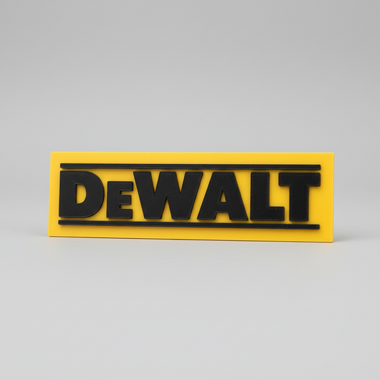 Hand holding a yellow and black Dewalt sign against a blurred background