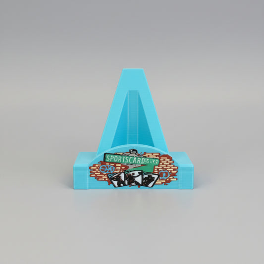 Hand holding a small triangular sign with graphics and text against a blue background with similar signs.