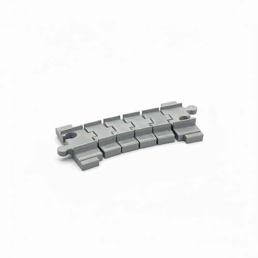3D-printed mechanical component on a gray background