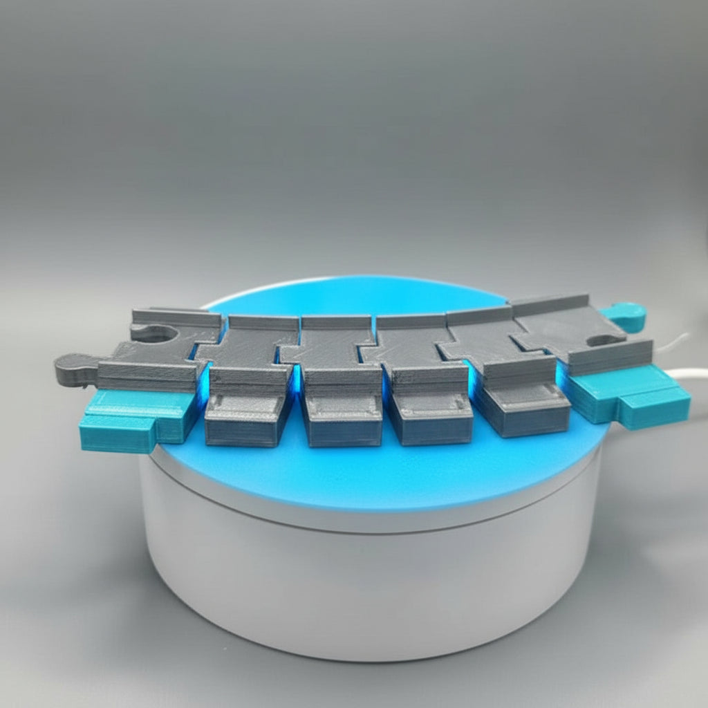 3D-printed logo on a blue and gray background