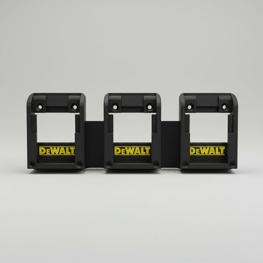 Three Dewalt battery holders on a textured gray surface