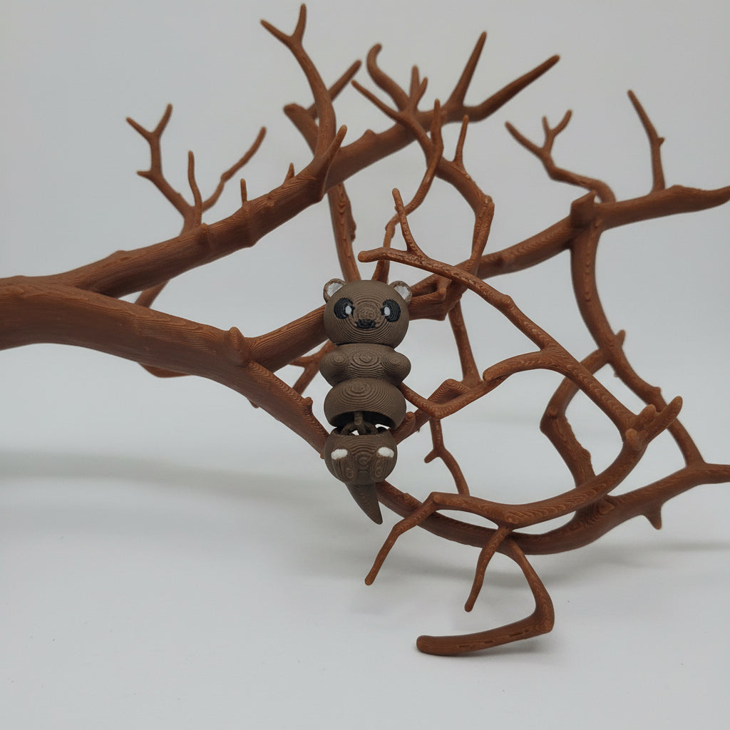 Toy spider with detailed legs on a textured surface