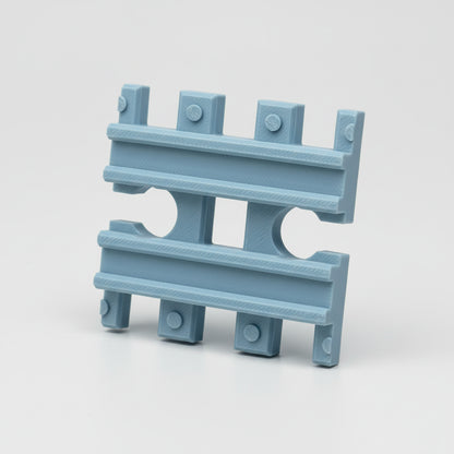 Light blue metal bracket on a textured gray background