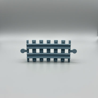 Small blue bench model on a textured gray background