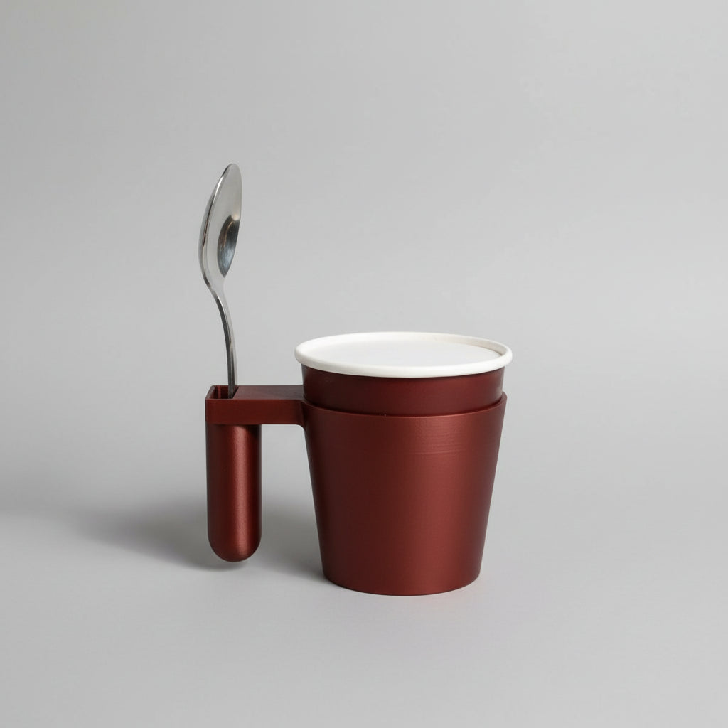 Hand holding a container with a spoon, featuring a label on a neutral background