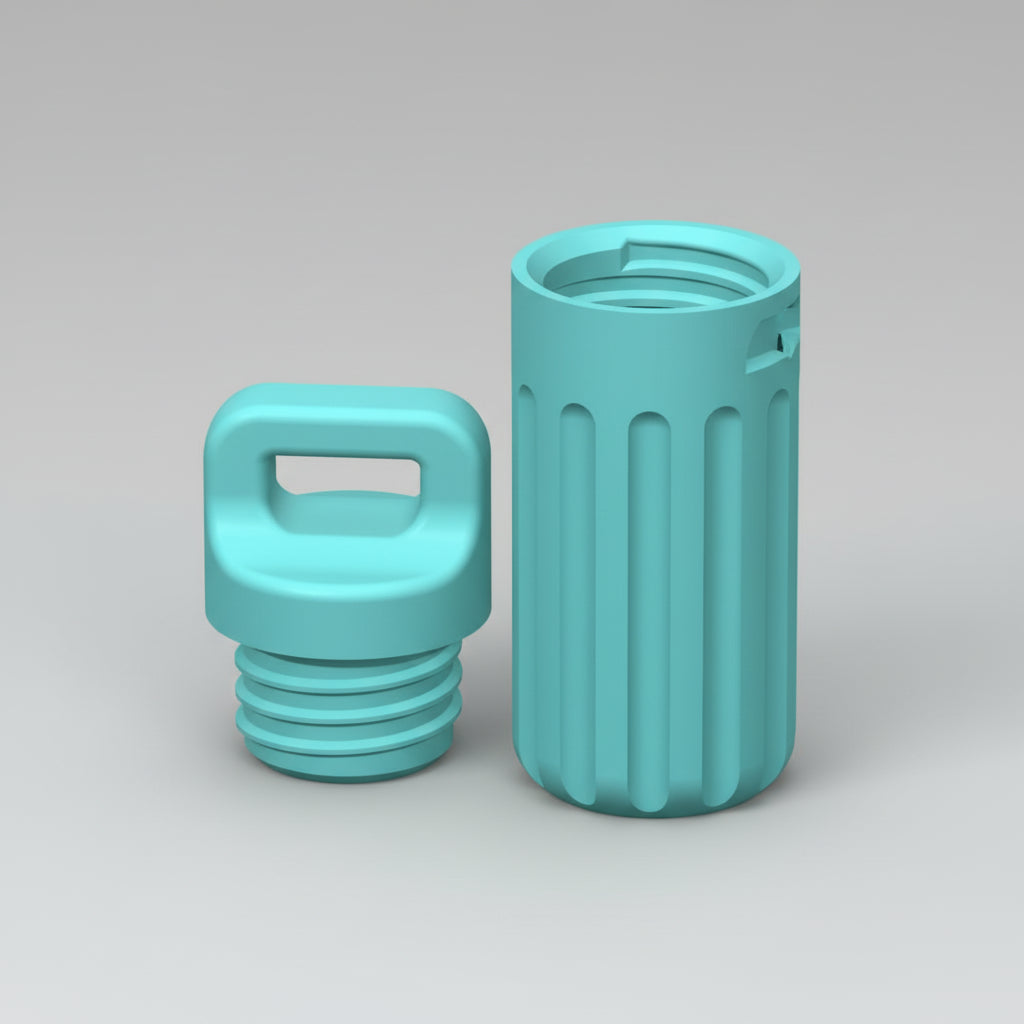 Two turquoise plastic parts on a grid background