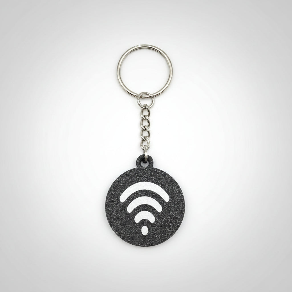 Keychain with Wi-Fi symbol on a wooden surface
