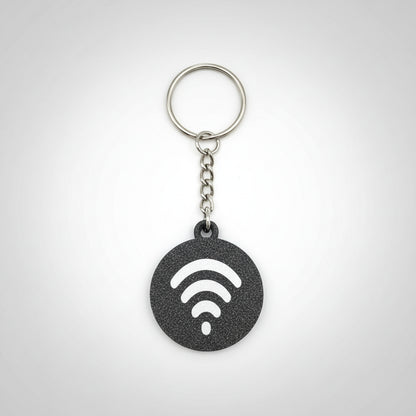 Keychain with Wi-Fi symbol on a wooden surface