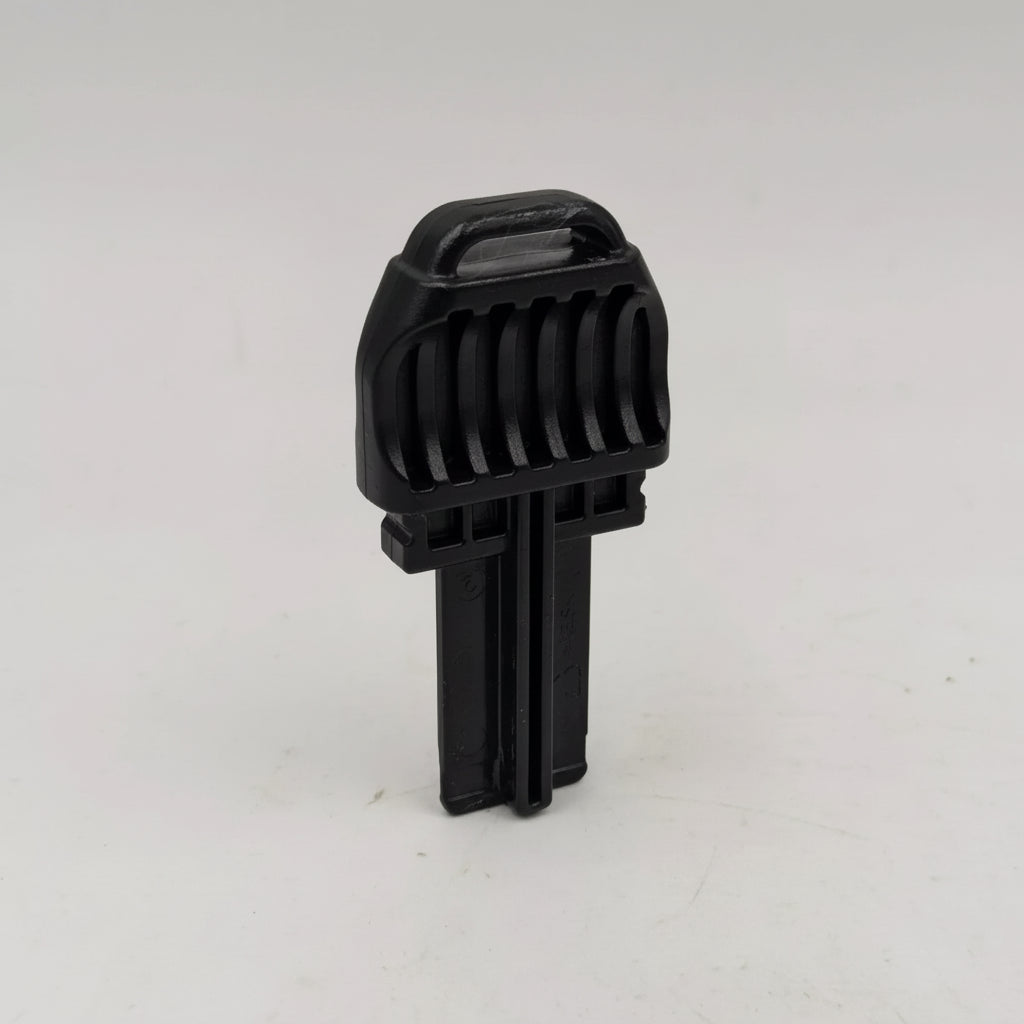 Black plastic clip on a white background