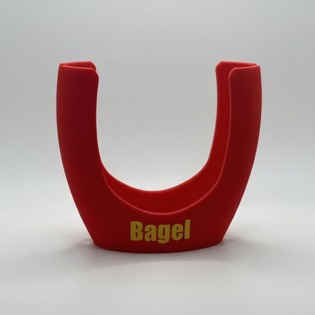 Red U-shaped tool with 'Bagel' text on a white background